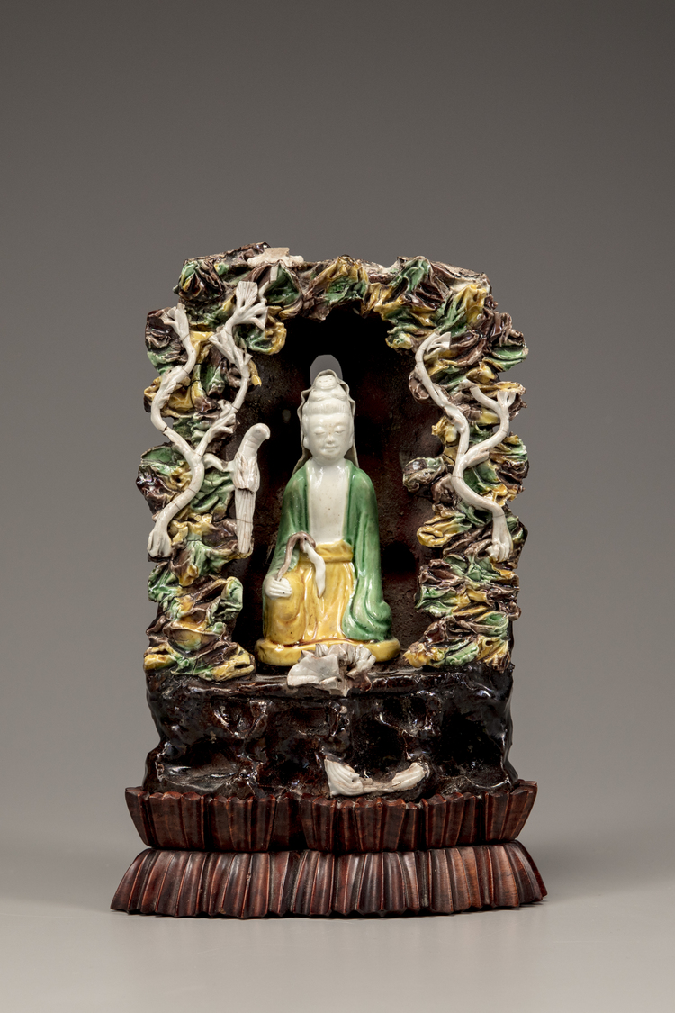 A Chinese green, yellow, and aubergine-glazed grotto
