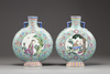 A matched pair of Chinese turquoise-ground famille rose moonflasks