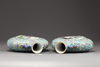 A matched pair of Chinese turquoise-ground famille rose moonflasks