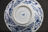 A large Chinese blue and white spiral moulded dish