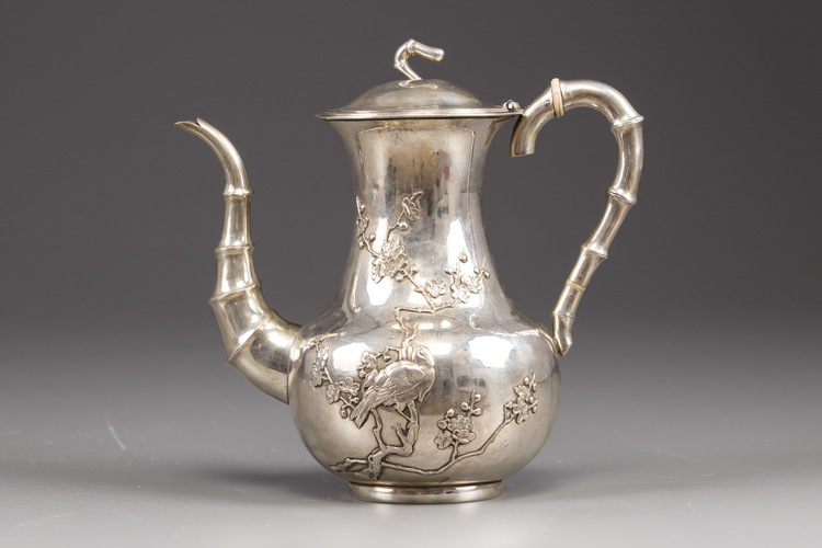 A Chinese export silver 'bird and flower' coffee pot