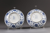 A pair of Chinese blue and white 'lotus' dishes
