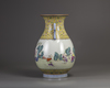 A Chinese yellow-ground famille rose 'boys' pear-shaped vase