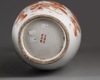 A pair of Chinese iron-red decorated 'Buddhist lion' vases