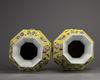 A pair of Chinese yellow-ground appliqué-decorated octagonal vases