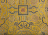 A large strip of Chinese yellow ground gold brocade silk