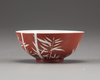 A Chinese coral-ground reserve decorated 'bamboo' bowl