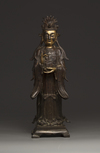 A Chinese parcel-gilt bronze figure of Xiwangmu