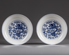 A pair of Chinese blue and white dragon dishes