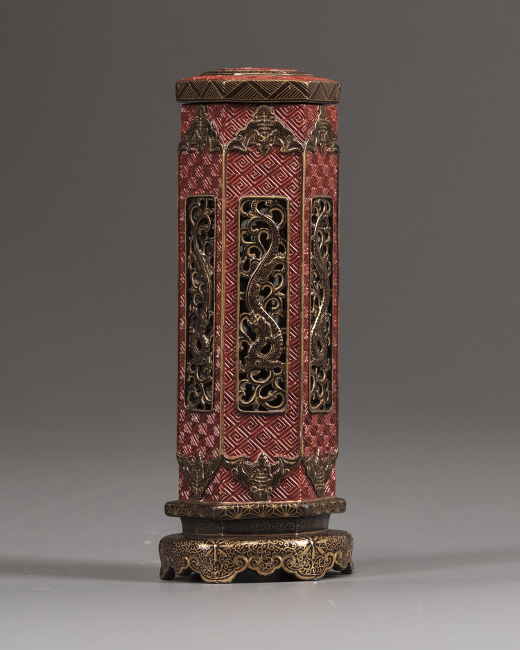 An Chinese openwork red-ground hexagonal incense burner, cover, and stand