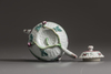 A small Chinese famille rose moulded teapot and cover