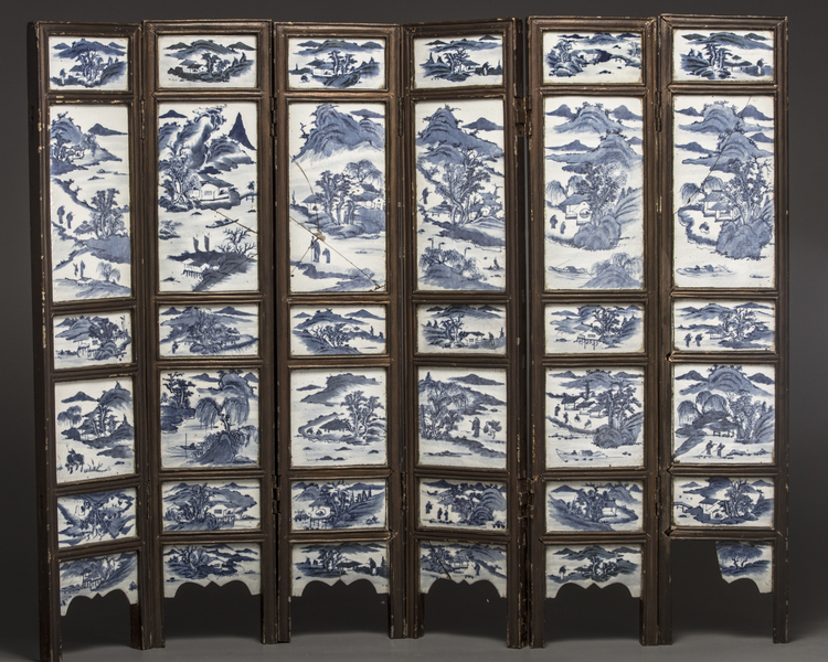 A Chinese six-fold screen inset with blue and white panels