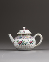 A small Chinese famille rose moulded teapot and cover