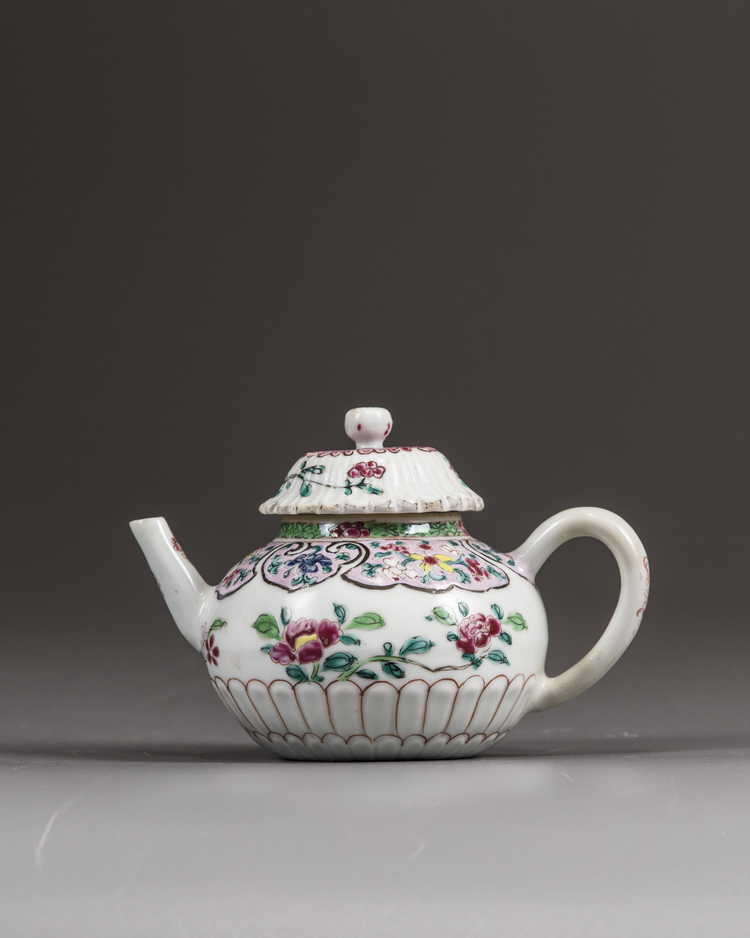 A small Chinese famille rose moulded teapot and cover