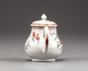 A Chinese famille rose teapot and cover