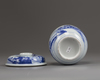 A Chinese Kangxi-style blue and white pot and cover