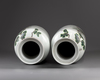 A pair of Chinese famille rose rouleau vases
