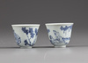 A pair of Chinese blue and white 'erotic' cups