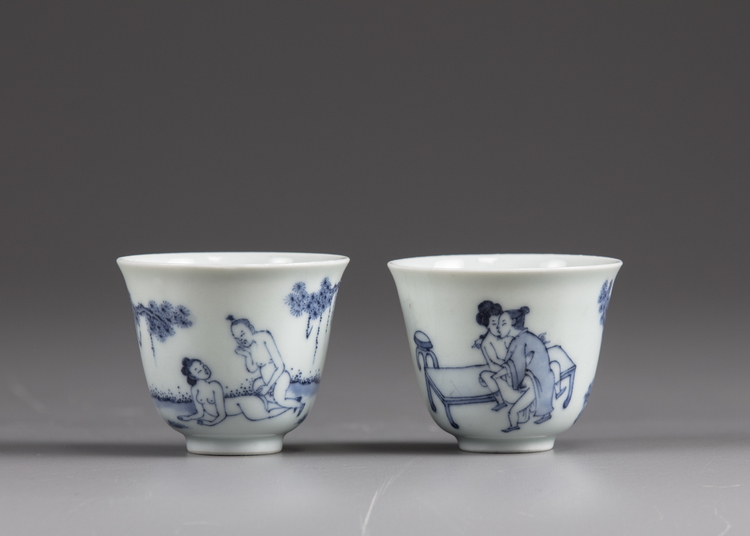 A pair of Chinese blue and white 'erotic' cups