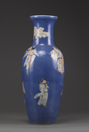 A Chinese powder-blue ground famille rose vase