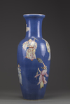 A Chinese powder-blue ground famille rose vase