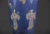 A Chinese powder-blue ground famille rose vase