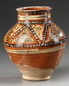 A SAMANID SLIP-PAINTED POTTERY JAR, 10TH-11TH CENTURY