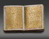 AN ILLUMINATED MINIATURE OTTOMAN QURAN WITH ENAMEL CASE, TURKEY, 19TH CENTURY