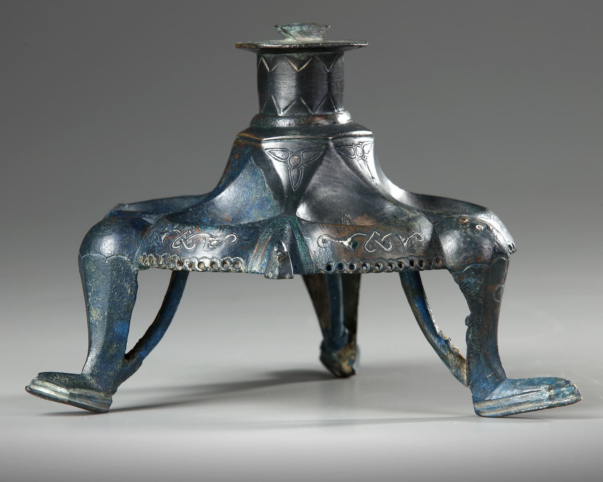 A KHORASAN SILVER INLAY LAMP STAND BASE , PERSIA, 12TH CENTURY