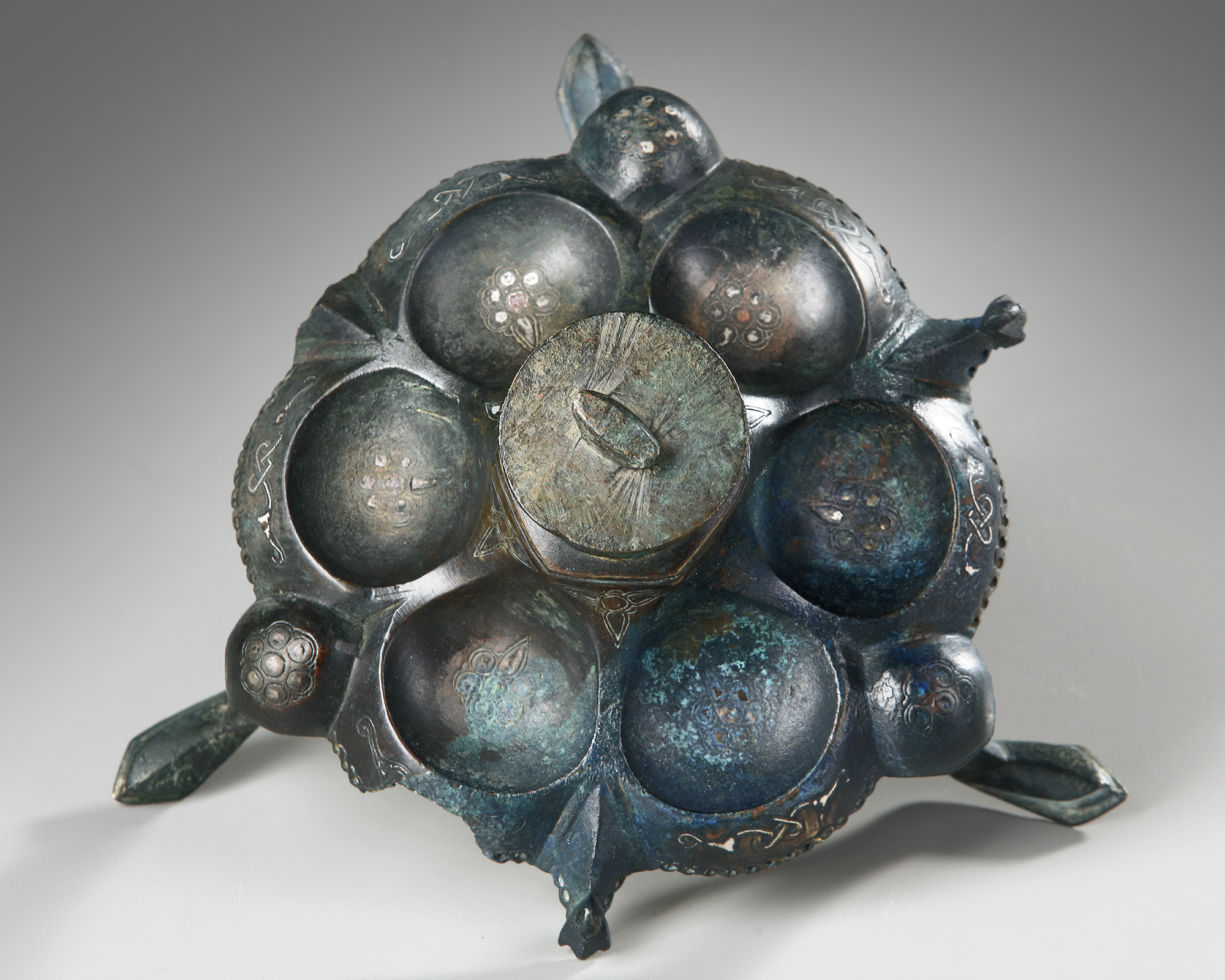 A KHORASAN SILVER INLAY LAMP STAND BASE , PERSIA, 12TH CENTURY