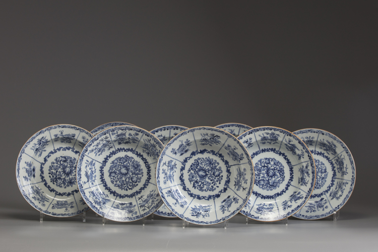 A set of eight Chinese blue and white soup plates