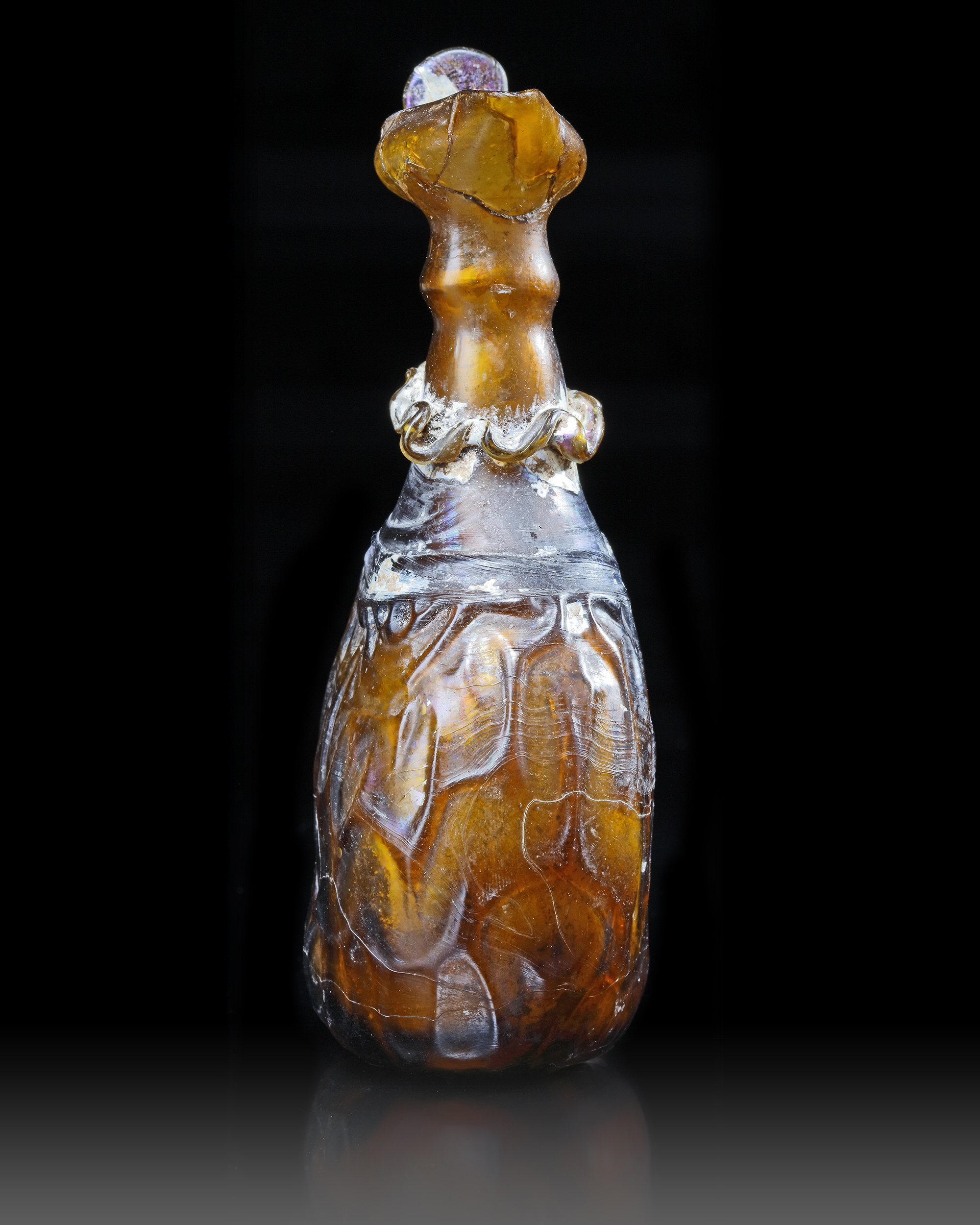 AN AMBER GLASS JUG, PERSIA, 10TH-11TH CENTURY