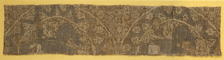 A RARE SELJUK WOVEN METAL THREAD BROCADE PANEL DEPICTING SPHINXES,  PERSIA, 11TH-12TH CENTURY