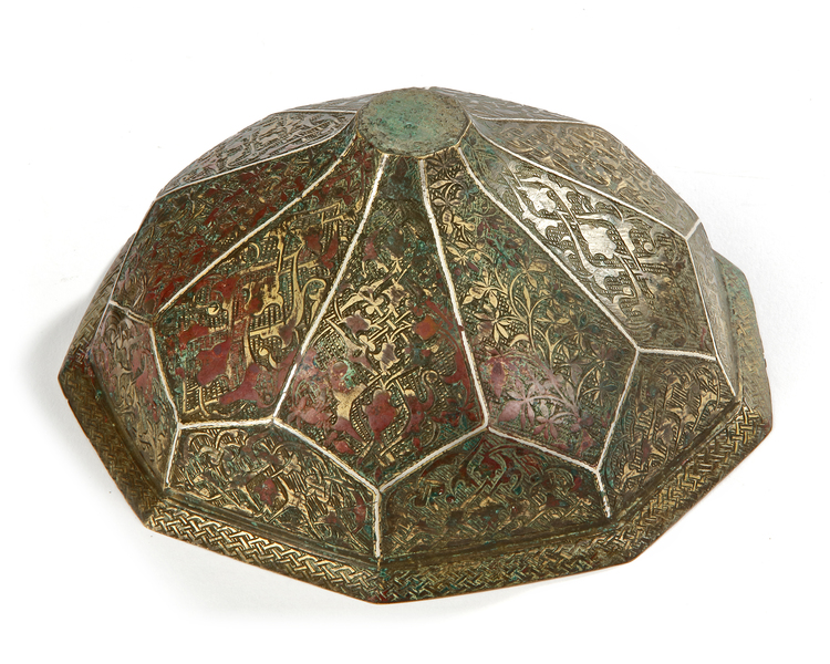 A KHORASAN SILVER-INLAID BRONZE HEXAGONAL COVER, CIRCA 1200