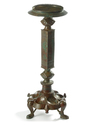 A LARGE KHURASAN BRONZE LAMPSTAND, EASTERN PERSIA, 12TH CENTURY