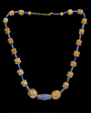 A FATIMID BEADED GOLD NECKLACE, LAPIS-LAZULI, 11TH-13TH CENTURY