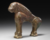 A BRONZE FATIMID MIRROR HANDLE IN THE FORM OF A LION, 11TH CENTURY