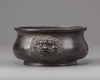 A Chinese bronze twin-lion handled censer