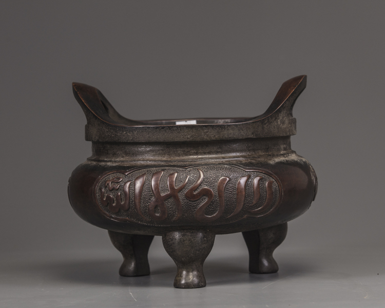 A Chinese large bronze Islamic-market tripod censer