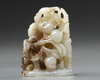 A CHINESE GREYISH CELADON JADE ‘LONGEVITY’ HAT FINIAL, YUAN DYNASTY (1271-1368)