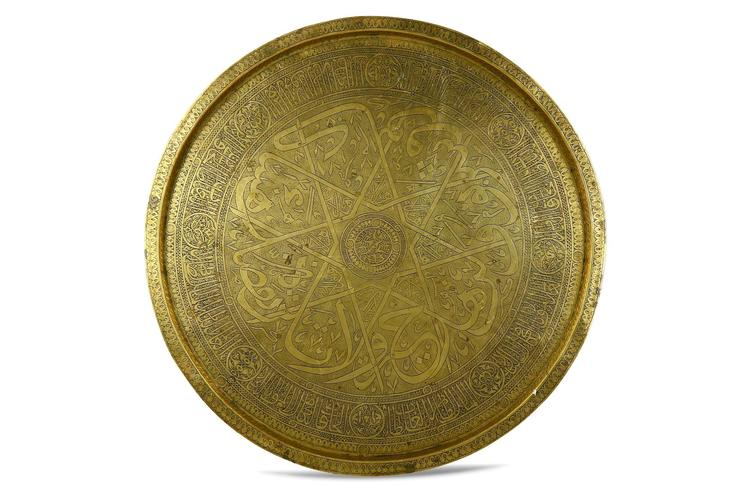 A LARGE ENGRAVED REVIVAL BRASS TRAY