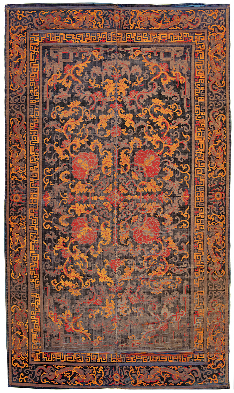 A RARE CHINESE CARPET WITH DRAGONS AND LOTUS, LATE MING DYNASTY