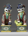 A LARGE PAIR OF CHINESE GLAZED-BISCUIT FAMILLE-VERTE FIGURES OF BUDDHIST LIONS, QING DYNASTY, 19TH CENTURY