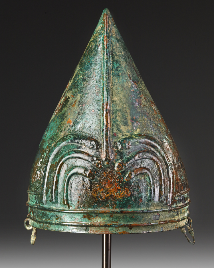 AN URARTIAN BRONZE HELMET, CIRCA 9TH-7TH CENTURY B.C.