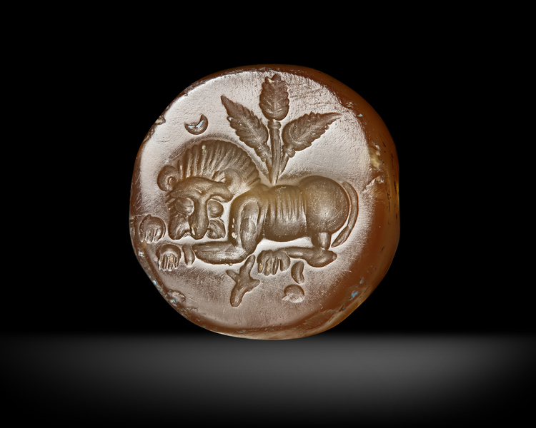 A SASSANIAN AGATE DOMED SEAL OF A CROUCHING LION, CIRCA 5TH CENTURY A.D.