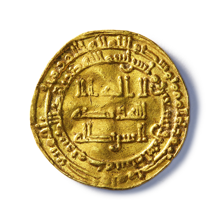 AN ISLAMIC GOLD DINAR MINTED DURING THE ABBASID DYNASTY, THE CALIPH ALMUKTAI, IN 292 AH/904 AD AT MECCA