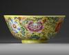 A FAMILLE-ROSE YELLOW-GROUND 'FLORAL' BOWL, DAOGUANG UNDERGLAZE BLUE SEAL MARK AND PROBABLY OF THE PERIOD (1820-1850)