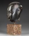 AN EGYPTIAN DIORITE HEAD OF AN OFFICIAL, LATE PERIOD, 30TH DYNASTY, 380-343 B.C.