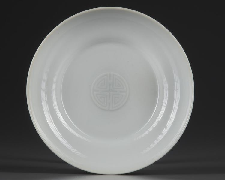 A  FINE CHINESE MOULDED WHITE-GLAZED 'BATS' DISH