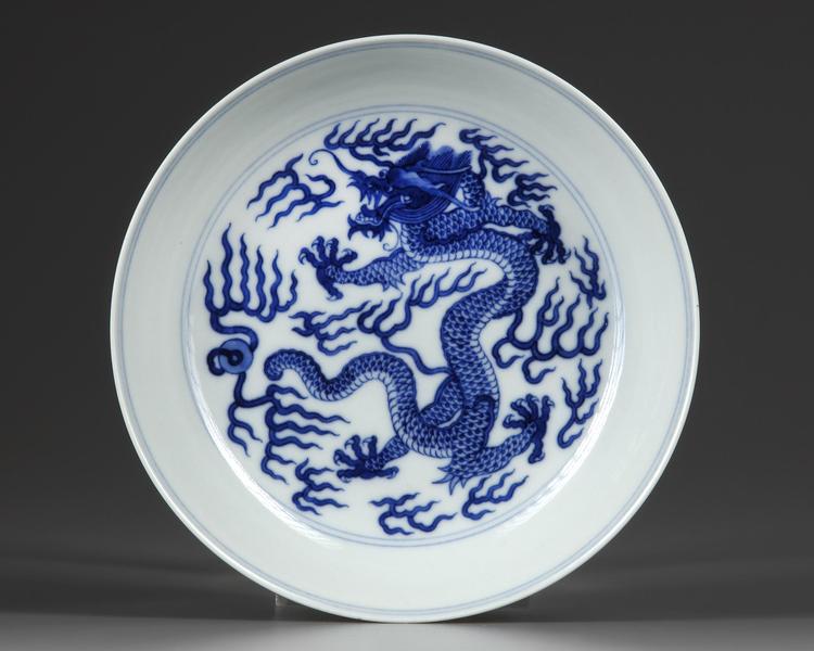 A CHINESE BLUE AND WHITE 'DRAGON' DISHE, DAOGUANG UNDERGLAZE BLUE SEAL MARK AND OF THE PERIOD (1820-1850)